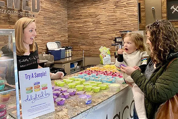 A publisher hosting a tasting event for a local family