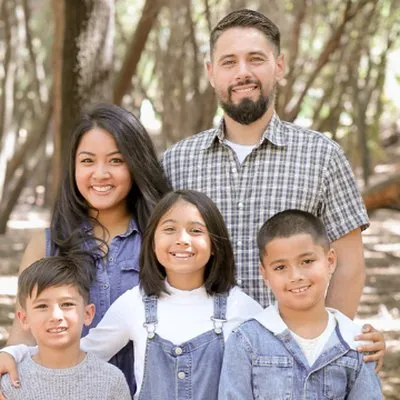Publishers Josh and Amy Stoner and family